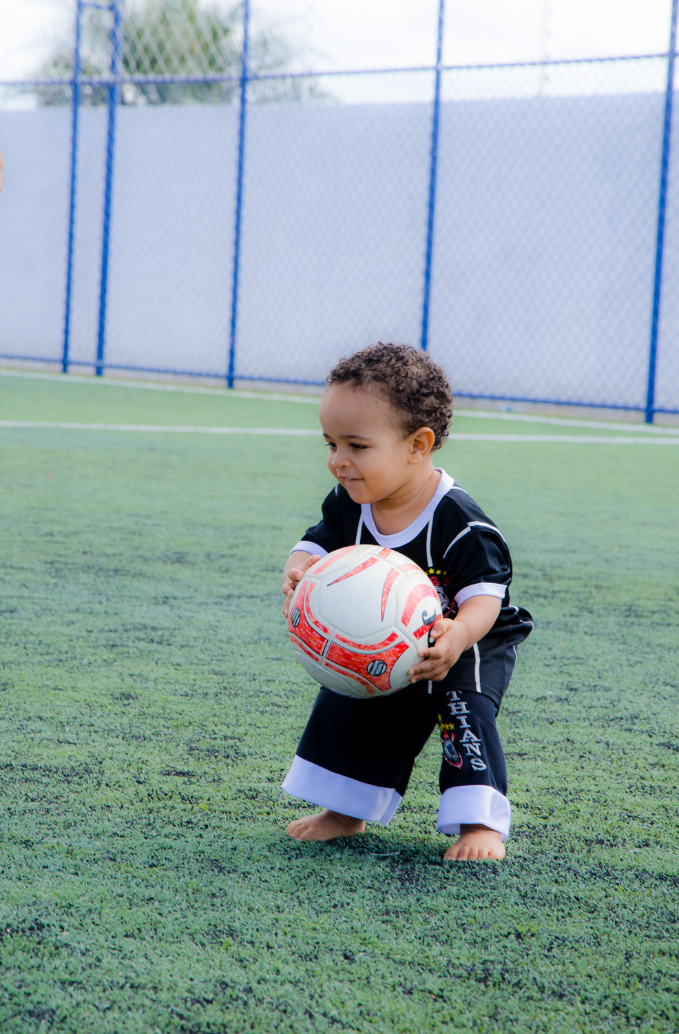 filho jogando bola