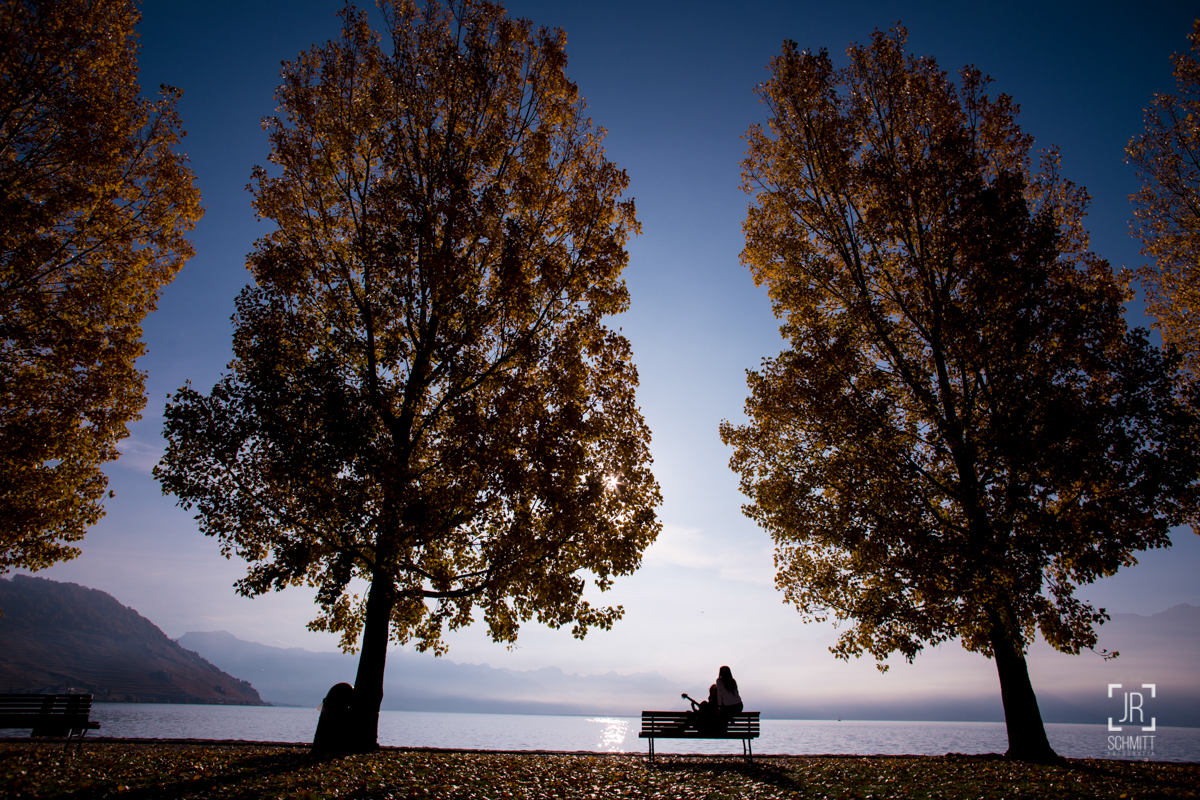 casal com violão no lac léman