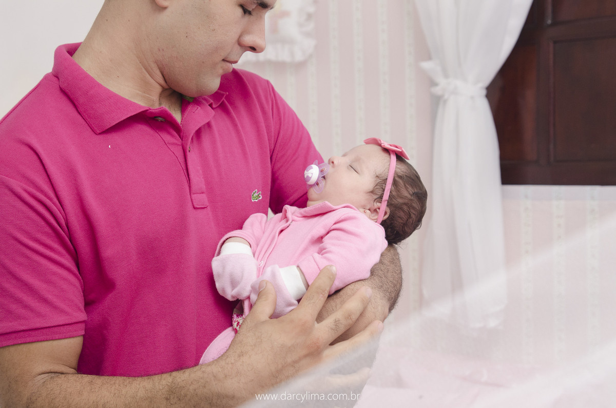 fotografia do pai com a bebe