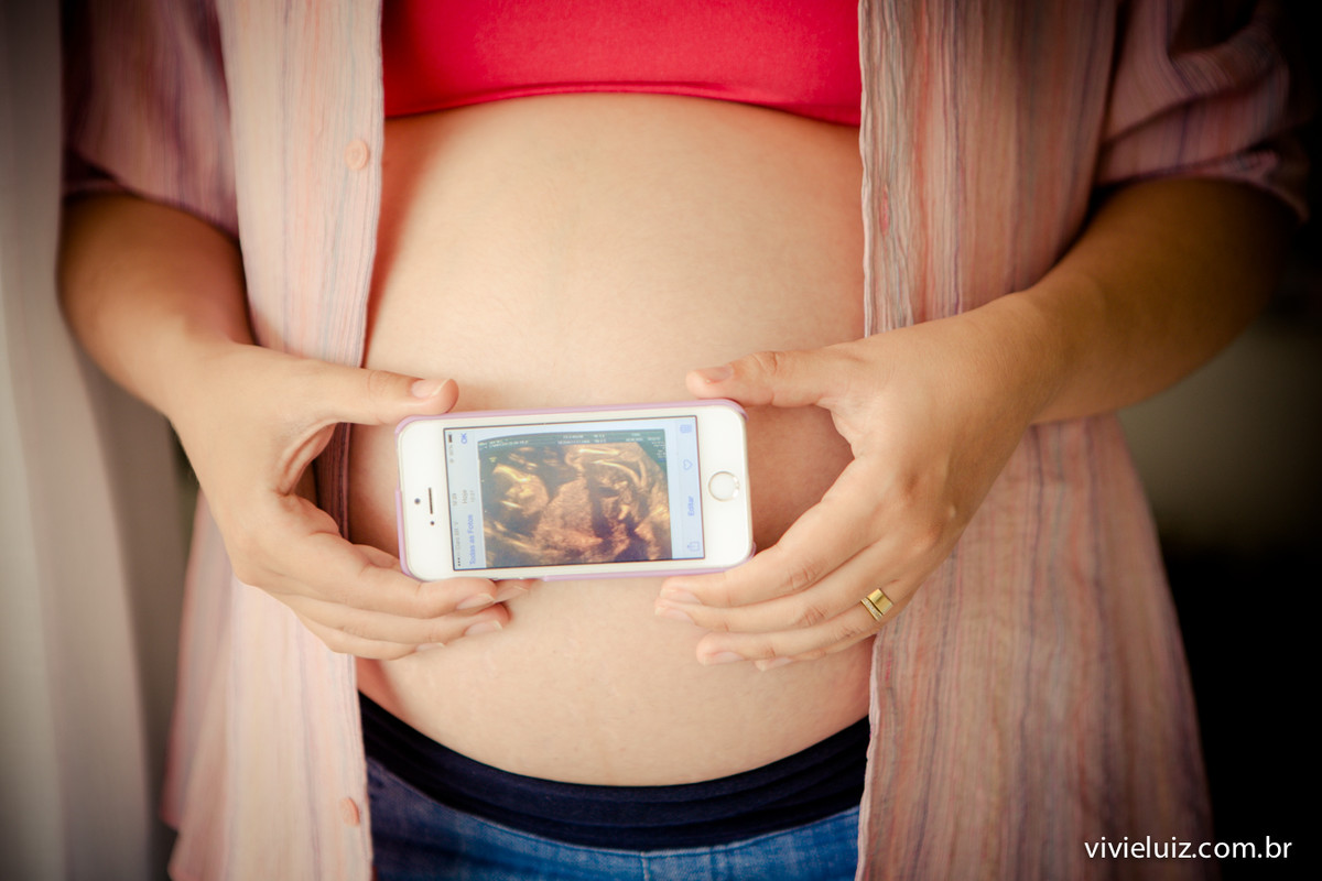 Outras sol no celular Na barriga da mãe