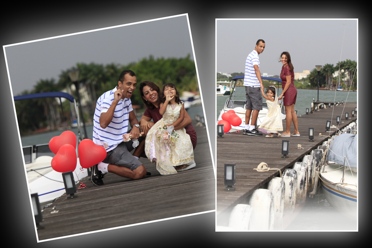 na passarela a familia posando entre os barcos para colocar em seu album fotografico este imagem registrada pelo fotografo nico que realiza book, ensaios fotografico, festa infantil e outros serviços fotograficos;