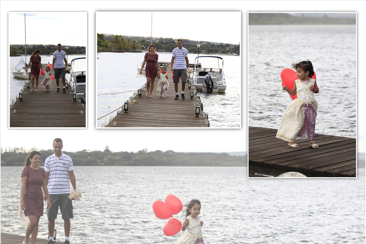 na beira do lago paranoa a modelo e seus pais desfilam na passarela perto de barcos e muita agua com baloes coloridos em vermelho o fotografo nico registrou todos esses momentos.