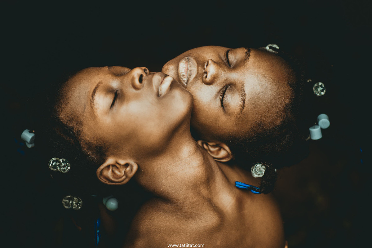 poetic portraits of Haitian children touching each other's souls