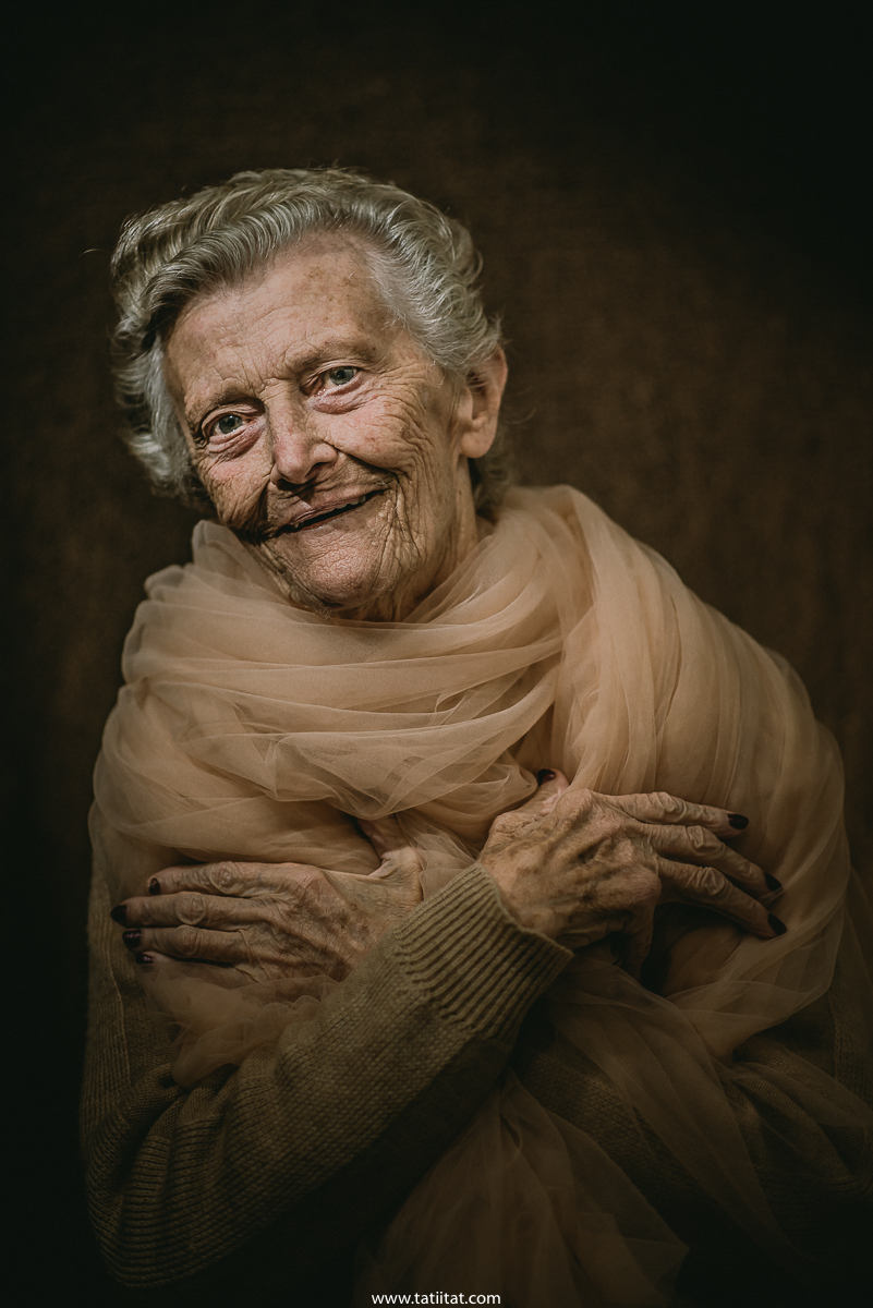 elderly woman expresses through tenderness and kindness look