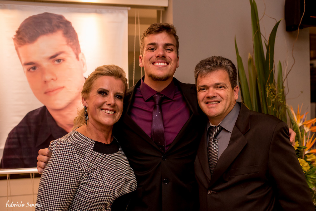 retrato do formando com seus pais