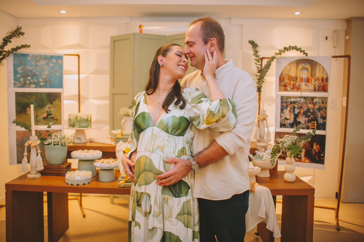 Mini sessão fotográfica de fotos da Manu e Marido Bruno durante a celebração da espera pelo Nino em Florianópolis.