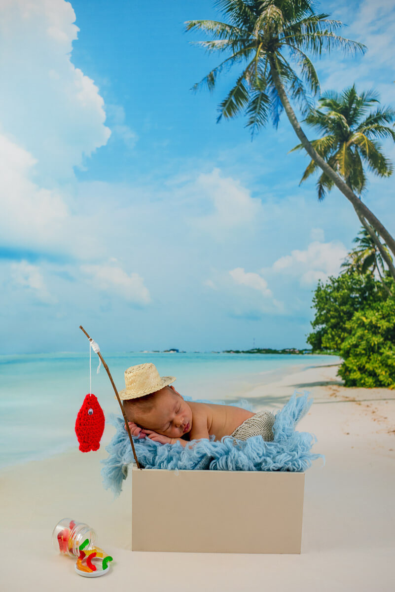 Ensaio newborn / Ensaio de newborn - Hoje foi dia de praia e dia de pesca.  O que levar? O bebe levou a vara de pescar e, se você achou que o bebe não ia conseguir pescar, se enganou. Ele pescou sim, um lindo peixe vermelho! Bebe fofuxo e esperto. 