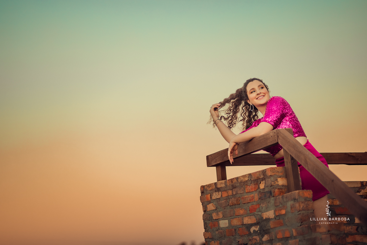 Ensaio-15-anos-ensaio-com-flores-por-do-sol-fotgrafa-de-lauro-muller