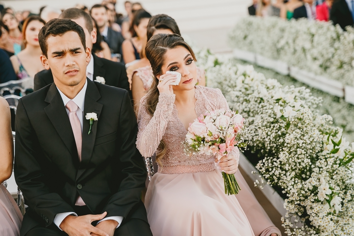 Troca das alianças na cerimônia Porto Vittoria em fotografia profissional de casamento Brasília Df pelo fotógrafo Philipe Nogueira