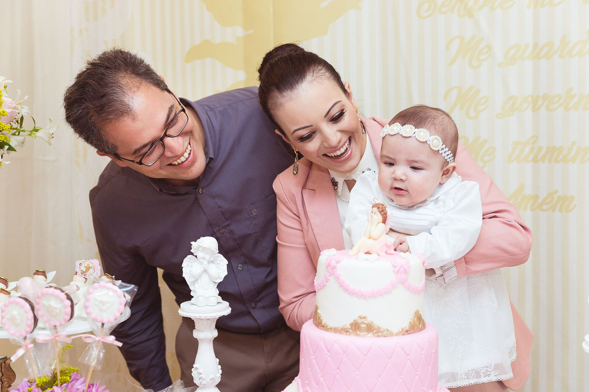Pais. Batizado Maria Laura. Casa de Eventos Bela Aliança. Fotografia de Eduardo Pasqualini, fotógrafo em Rio do Sul, Santa Catarina.
