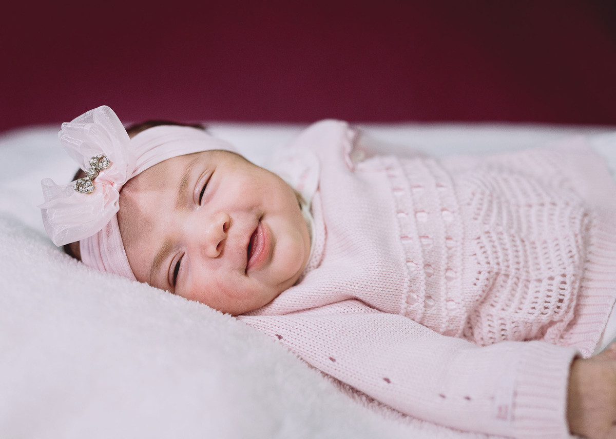 Caretas. Fotografia Documental de familía, Bebê um mês. Fotografia de Eduardo Pasqualini, fotógrafo em Rio do Sul, Santa Catarina.