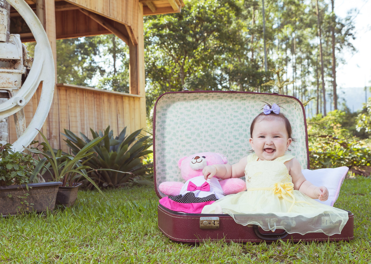 Bebe risonho. Fotografia de Eduardo Pasqualini, fotógrafo ensaios e família em Rio do Sul, Santa Catarina.