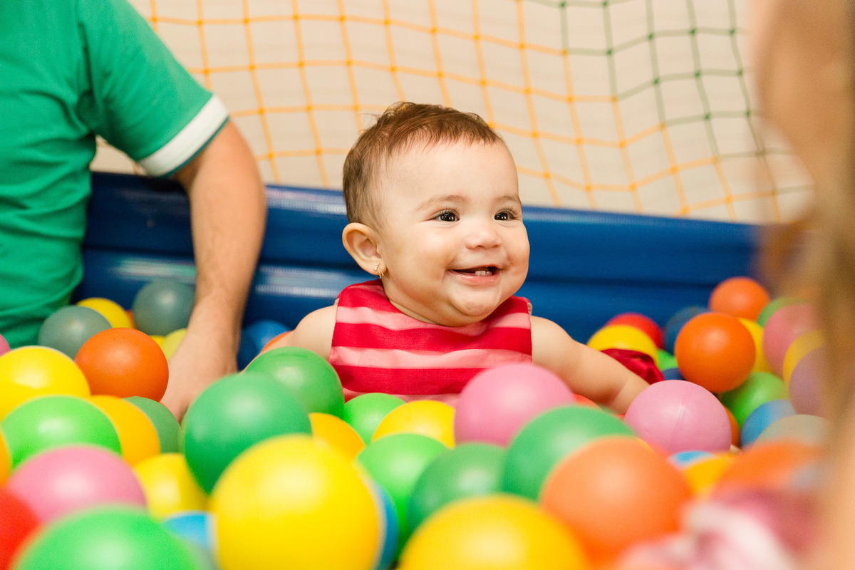 Dois dentes apenas. Um aninho da Maria Laura. Sede da OAB. Fotografia de Eduardo Pasqualini, fotógrafo de familia e infantil em Rio do Sul, Santa Catarina.