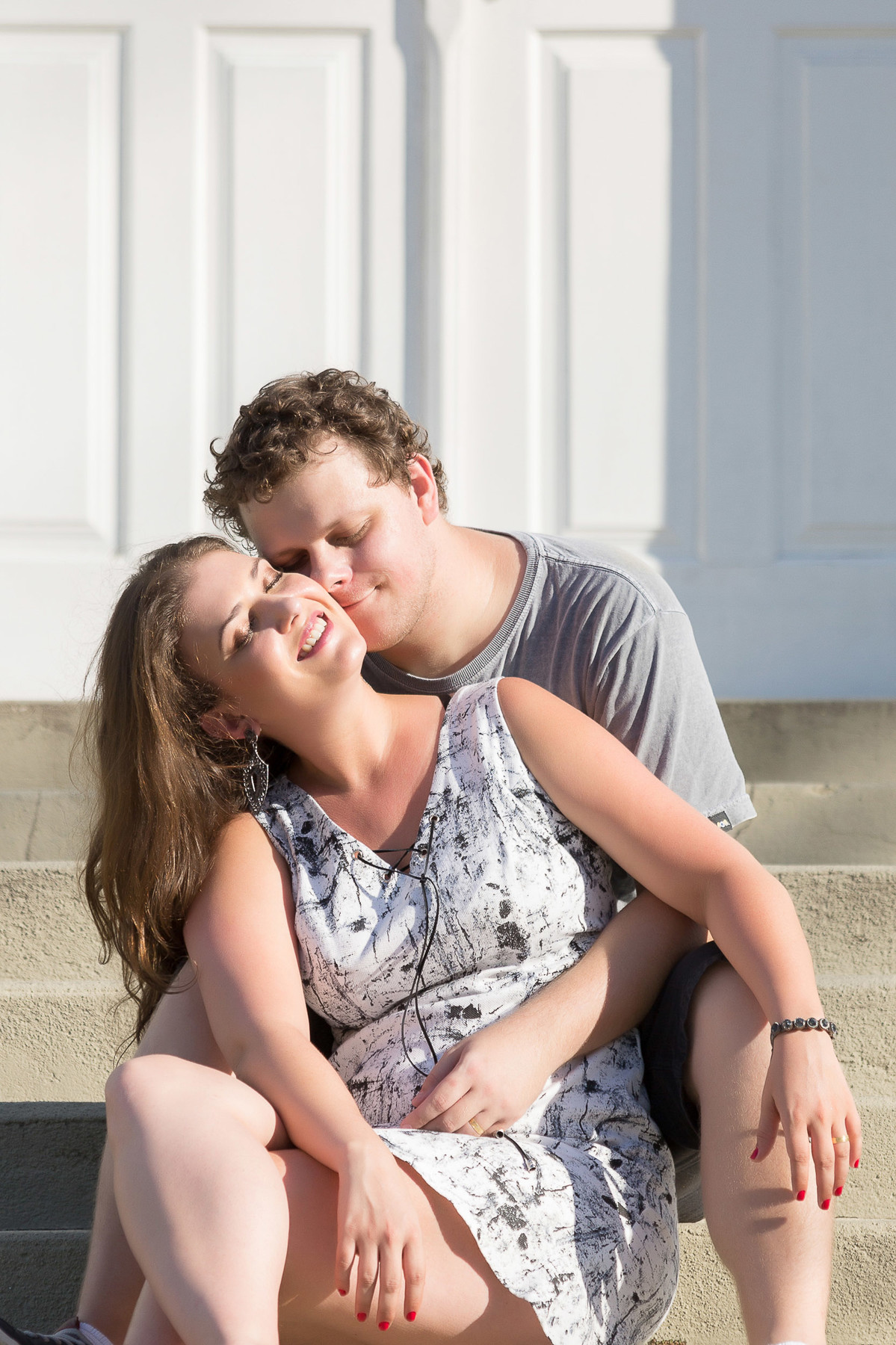 É bom aproveitar o sol e o carinho de quem amamos. Fotografia de Eduardo Pasqualini Fotógrafo profissional de ensaio e casamento em Rio do Sul, Santa Catarina, Brasil.