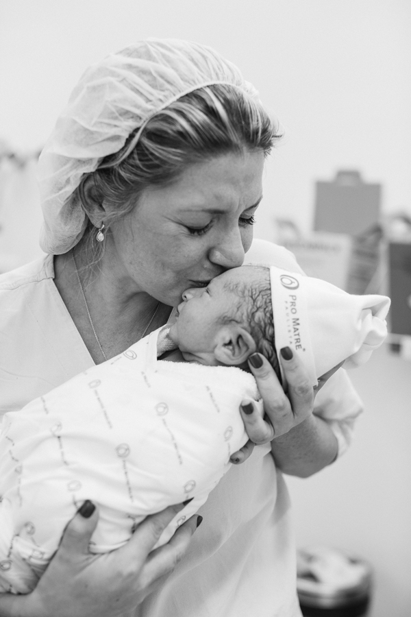 nascimento do afilhado pelas mãos da irmã