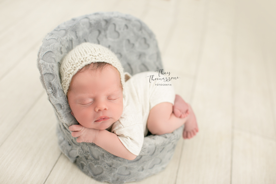 bebê dormindo em cadeirinha