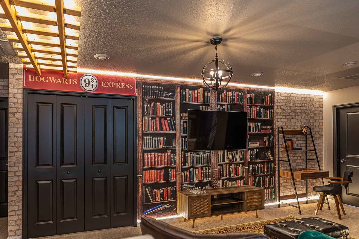 Iconic Harry Potter Themed Room: Dive into the magical world of Harry Potter with this creatively themed room, designed by architects to enchant guests of this Orlando vacation home.
