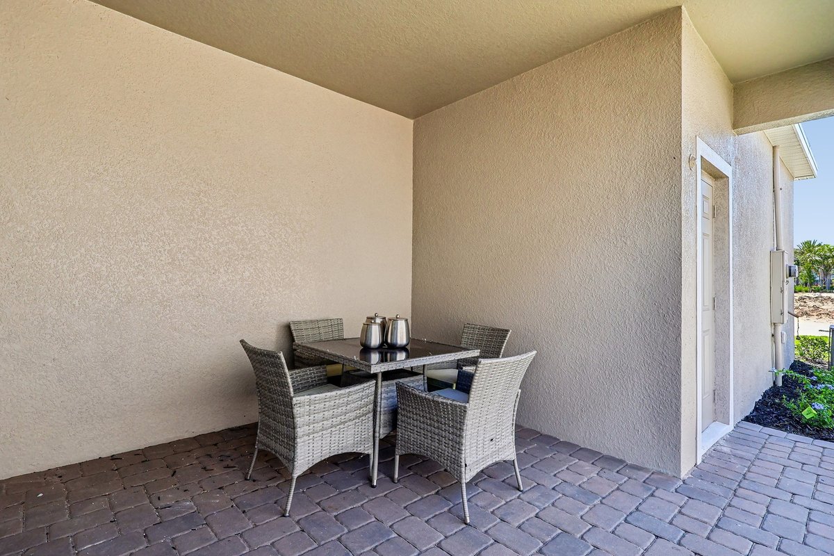 covered-rear-patio-wicker-outdoor-furniture-brick-paver-floor-community-view-5348-ctr-lk-rnch-blvd-st-cloud-fl