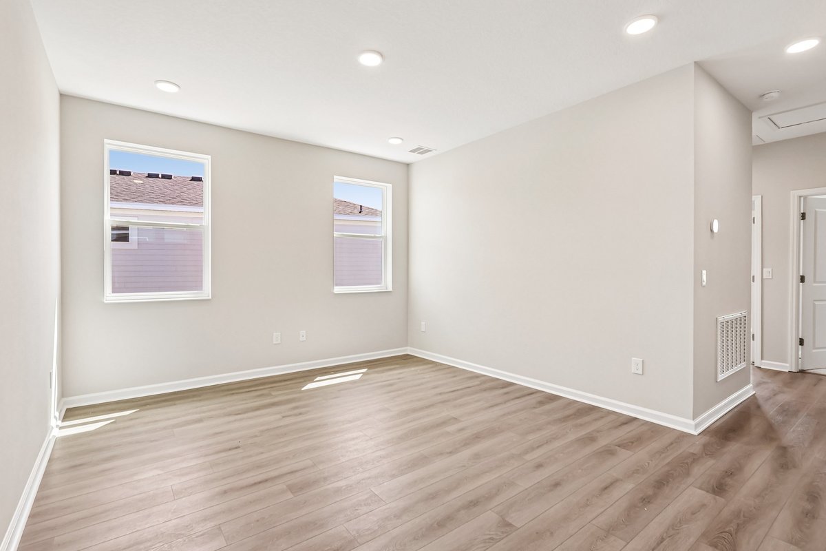spacious-bonus-room-vinyl-plank-flooring-recessed-lighting-two-windows-natural-light-5348-ctr-lk-rnch-blvd-st-cloud-fl