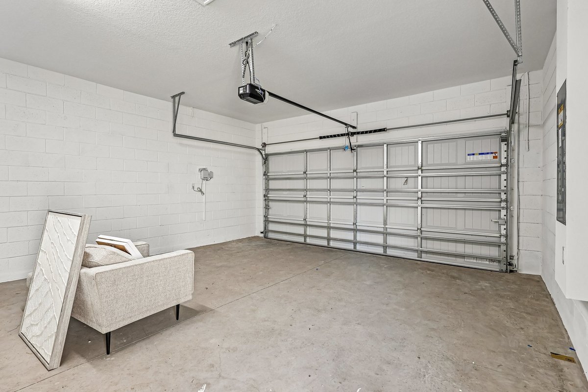 two-car-garage-automatic-door-opener-concrete-floor-electrical-panel-5348-ctr-lk-rnch-blvd-st-cloud-fl