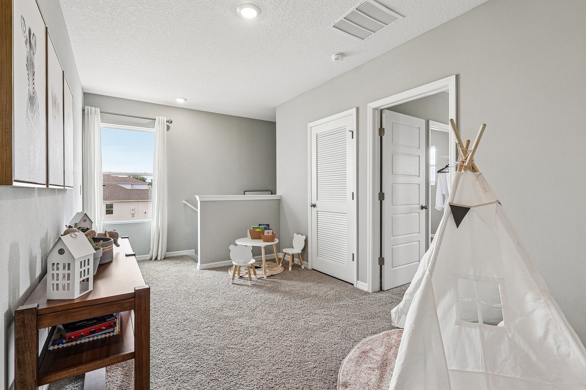 Upstairs loft area designed for family entertainment.
