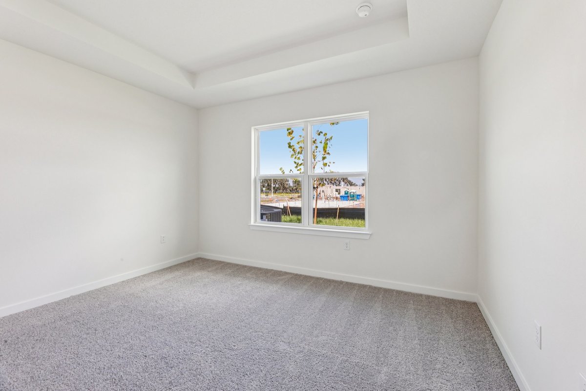 Master bedroom with walk-in closet and en-suite bathroom