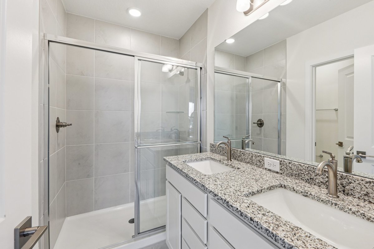 Master bedroom with walk-in closet and en-suite bathroom
