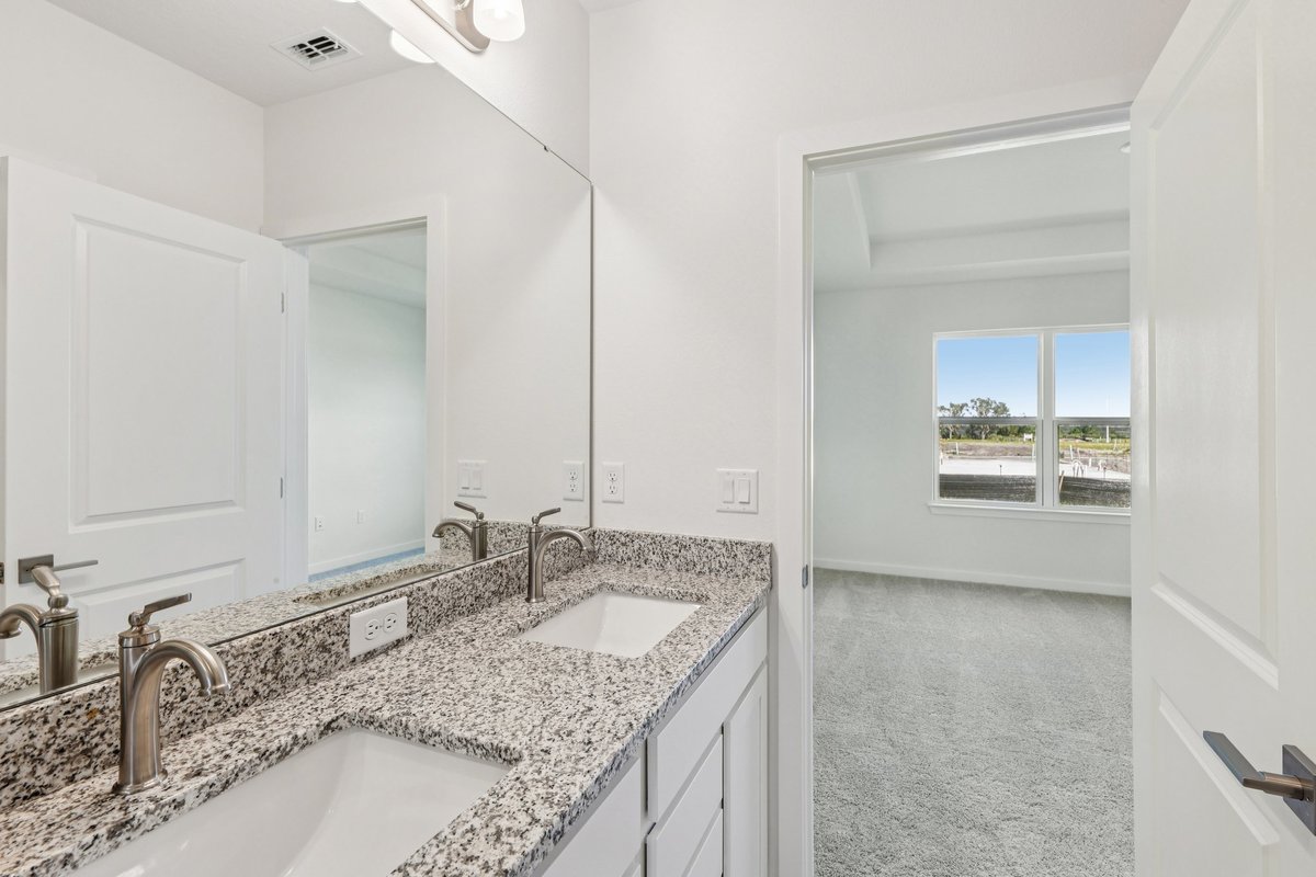Master bedroom with walk-in closet and en-suite bathroom