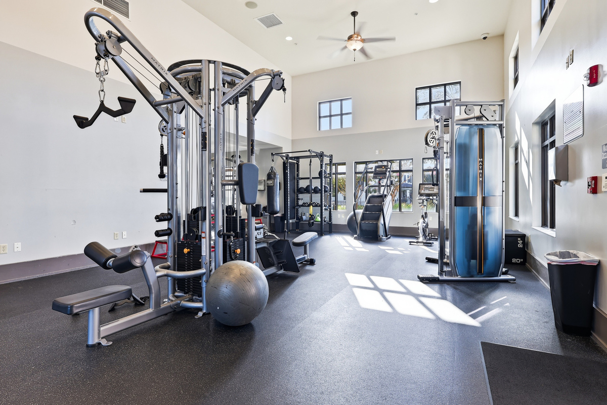 Large gim bedroom with balcony doors in Winter Garden FL home