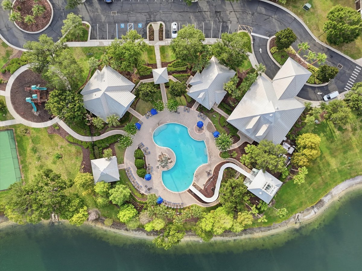 Top-down drone photo of clubhouse pool and amenity area in Groveland FL