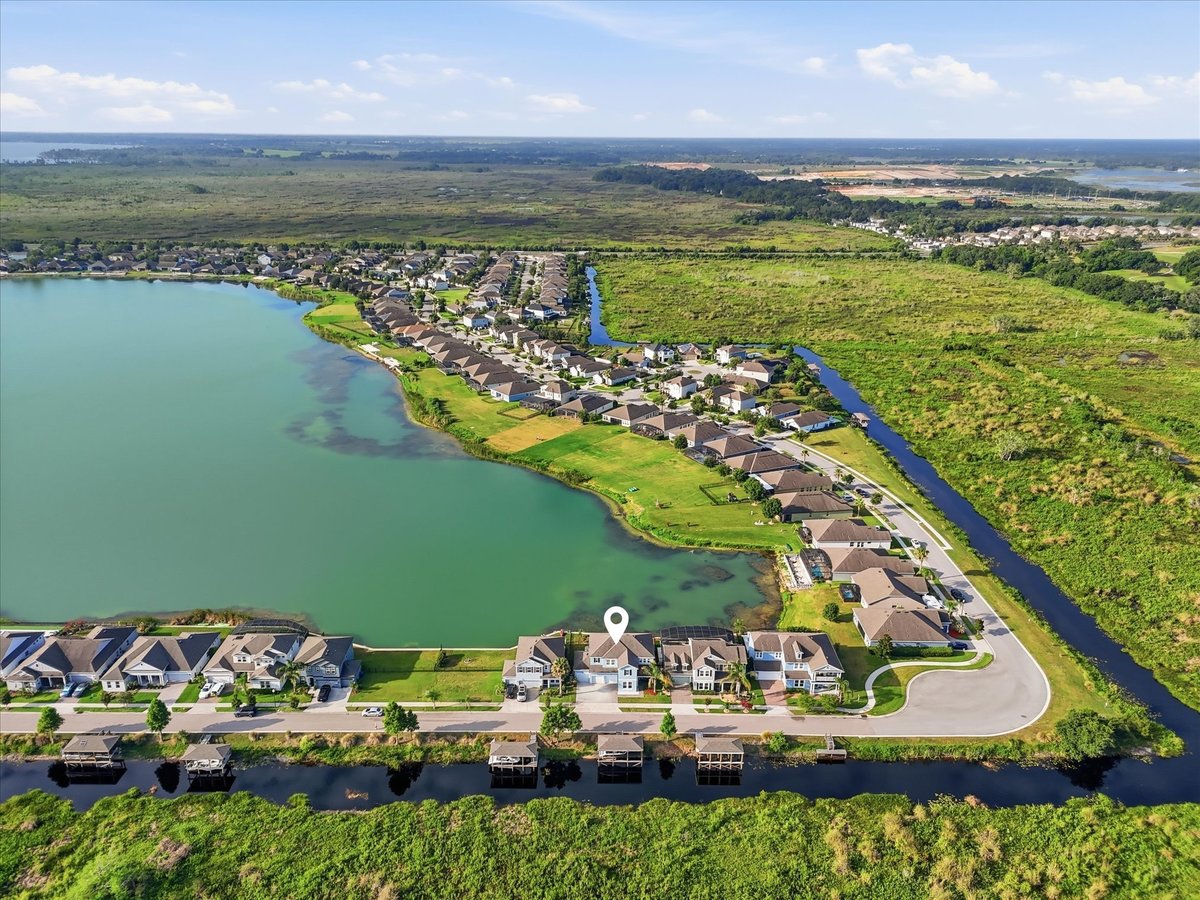 Drone image marking the location of 343 Blue Cypress Dr near the lake in Groveland FL