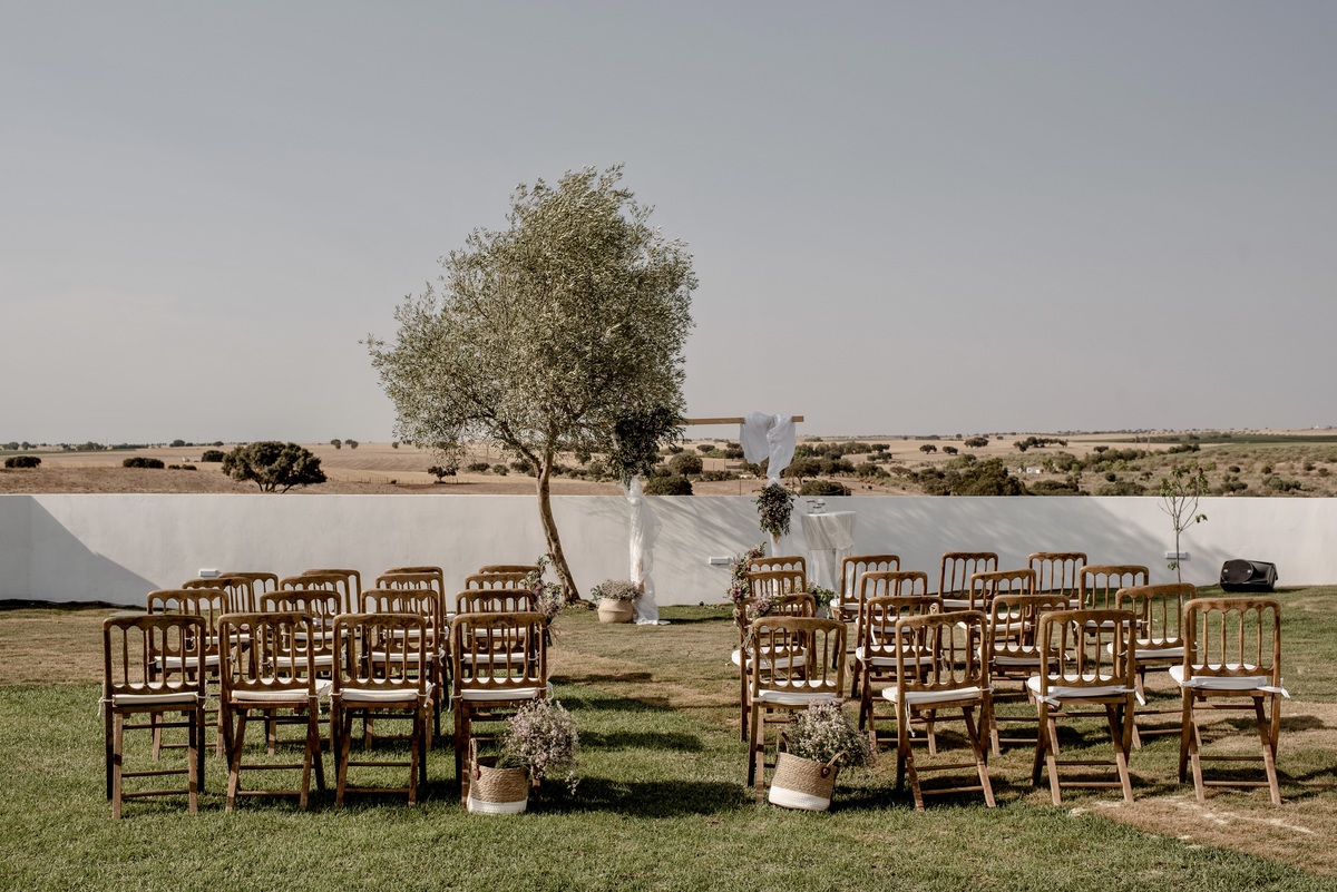 Reception space at São Lourenço do Barrocal set for a Portugal wedding dinner.