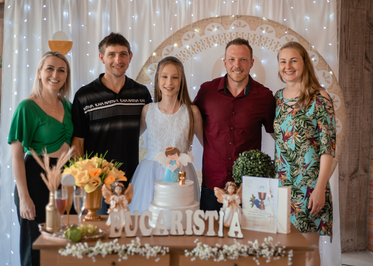 Fotos de familia na Primeira Eucaristia da Kelly Milena Froehlich 