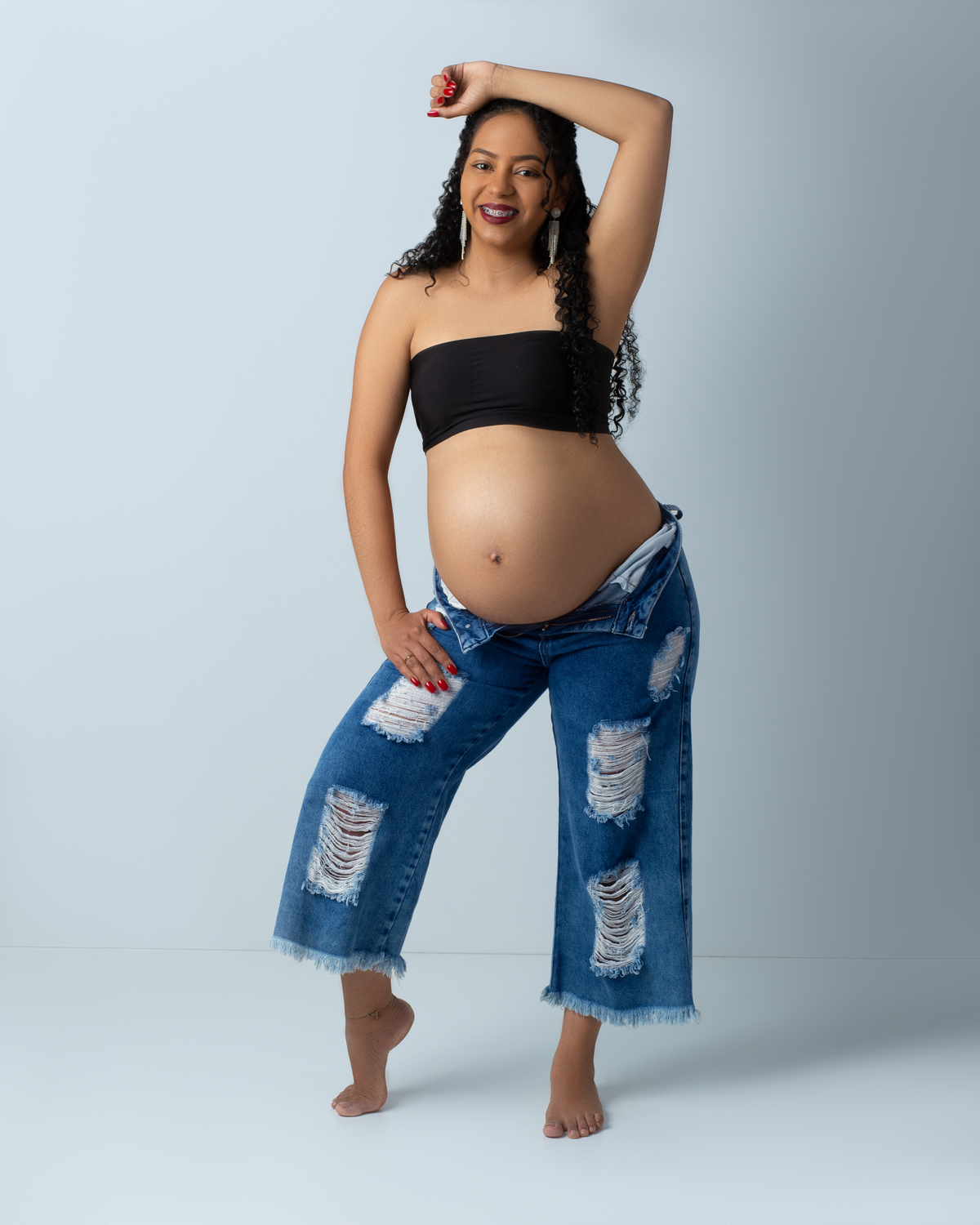 Calça jeans
Top preto
