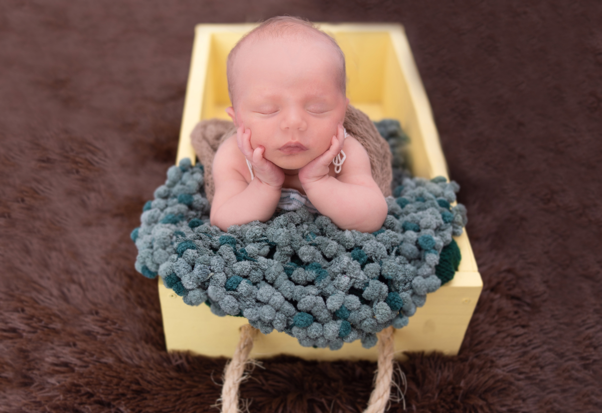 pose de bracinho no newborn em casa