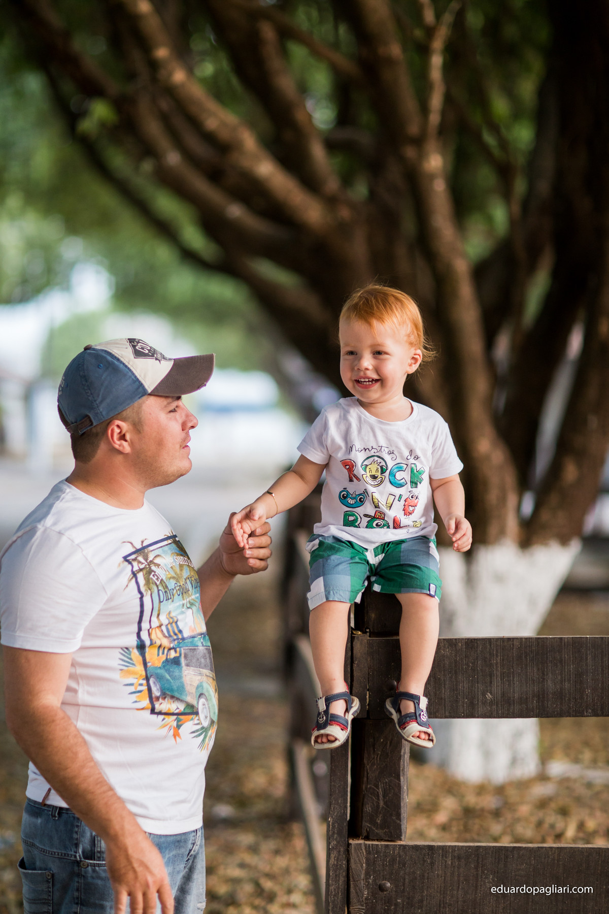 ensaio criança rindo com o pai