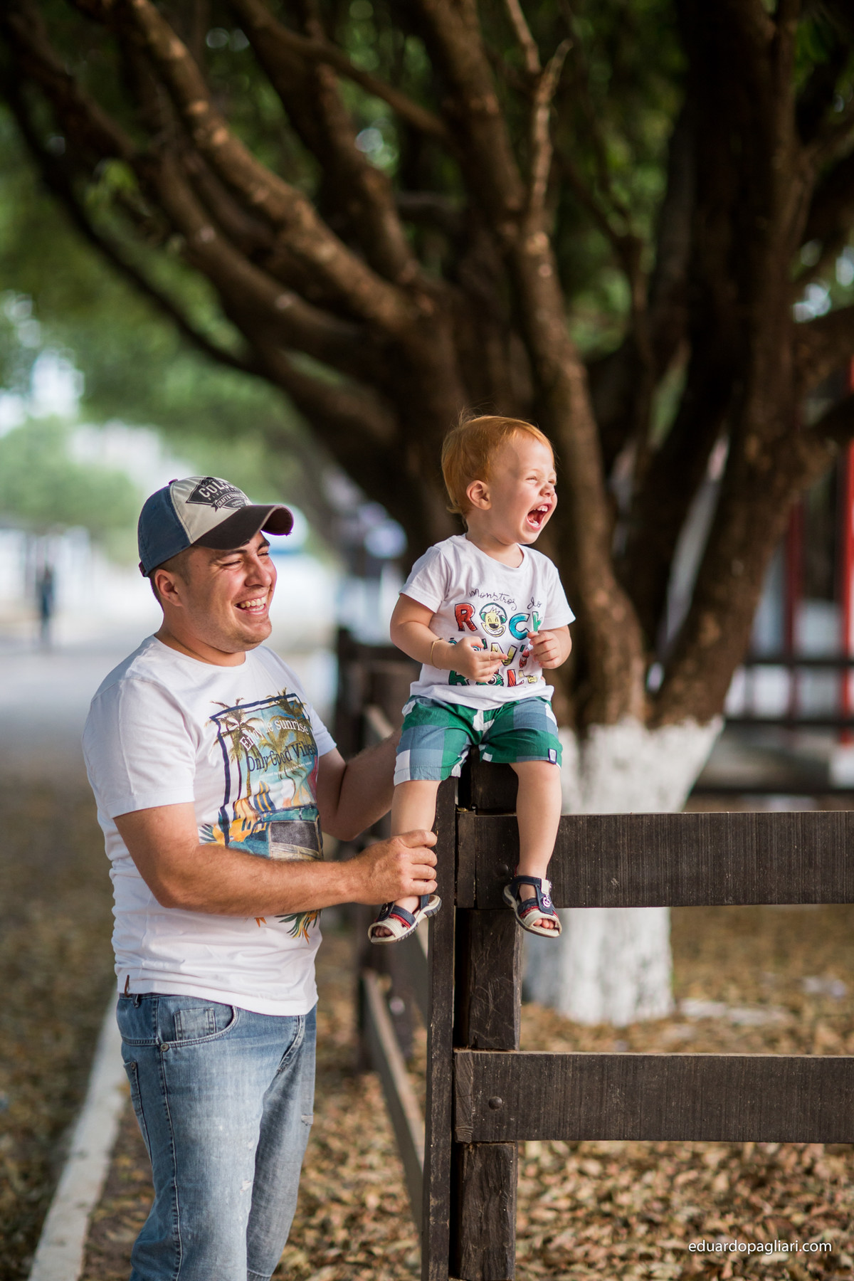 ensaio criança rindo com o pai