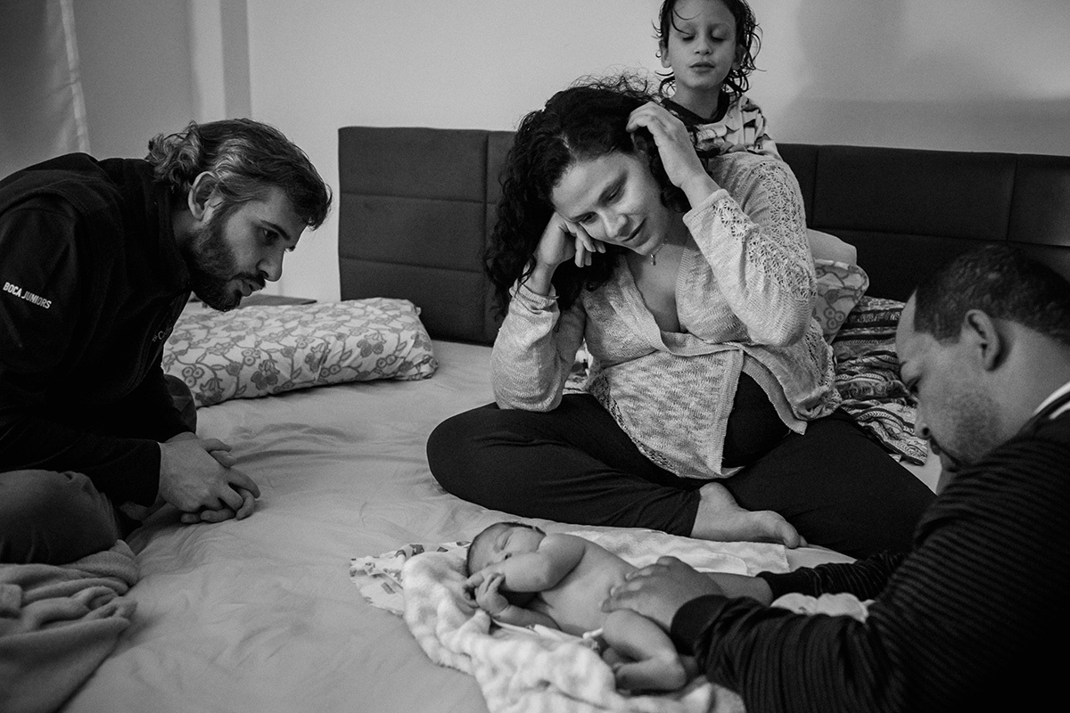 família no momento do primeiro exame do recém-nascido