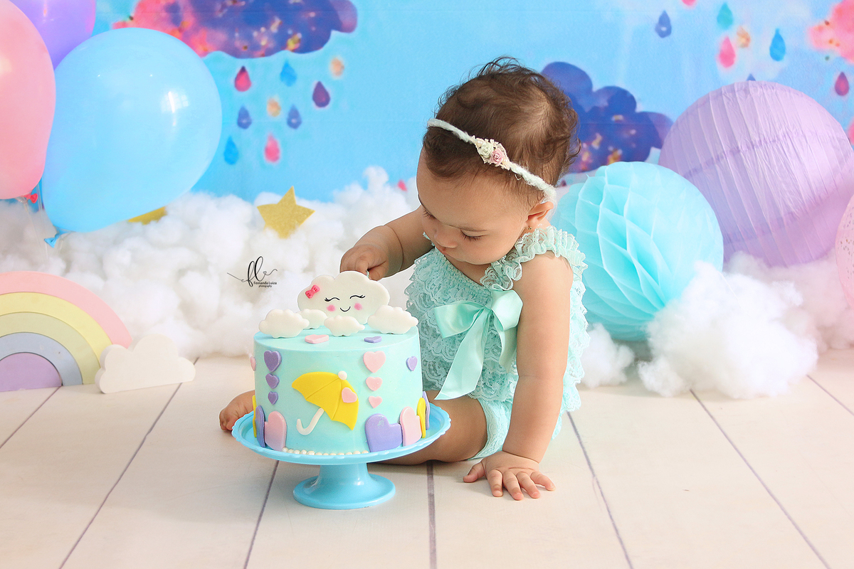 smash, smash the cake, sessão smash the cake, sessão do bolinho, cake smash, smash the cake tema chuva de amor, smash the cake cenário chuva de amor, chuva de amor, chuva de benção, smash the cake para menina, sessão de um ano no tema chuva de amor. 