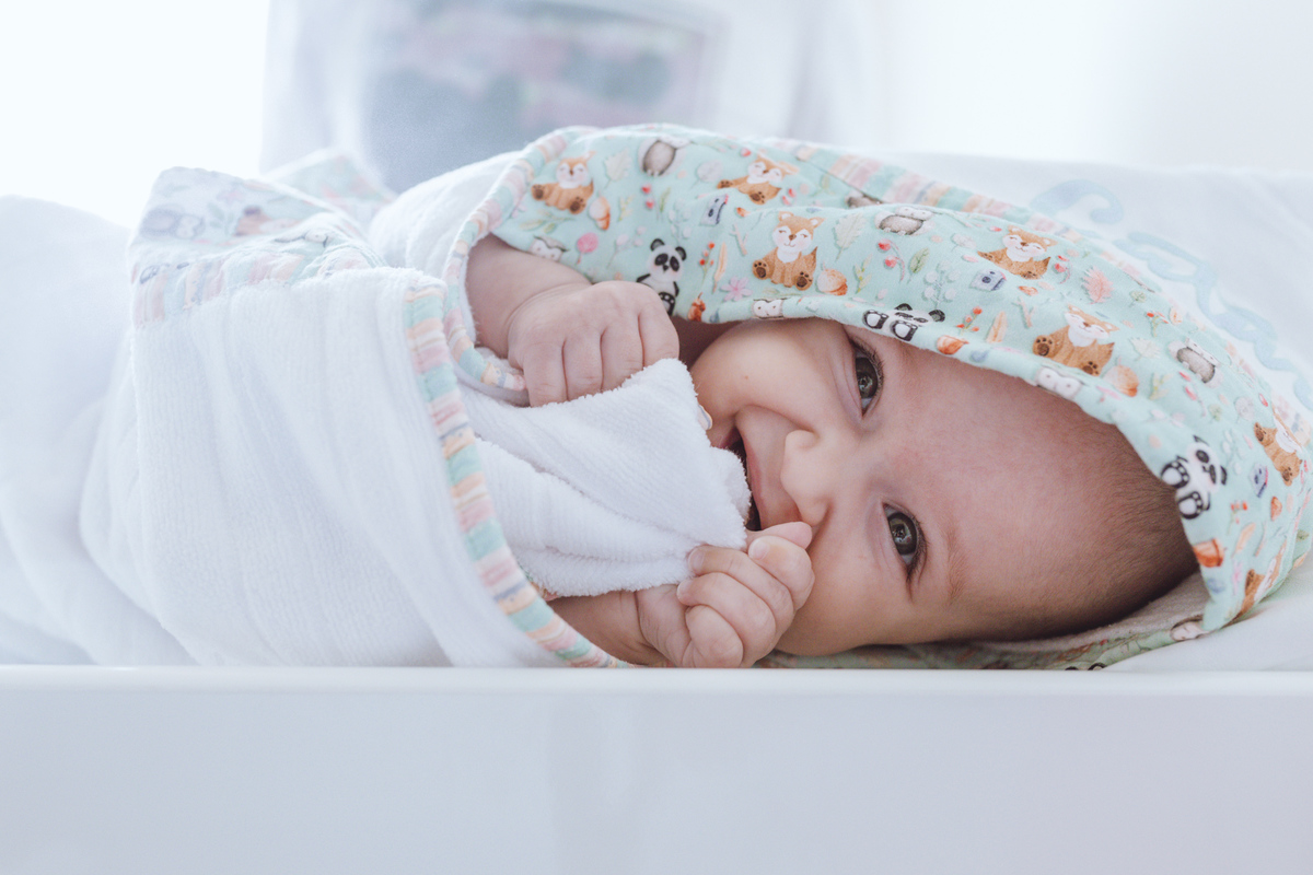 foto de bebê sorrindo ensaio infantil em Florianópolis
