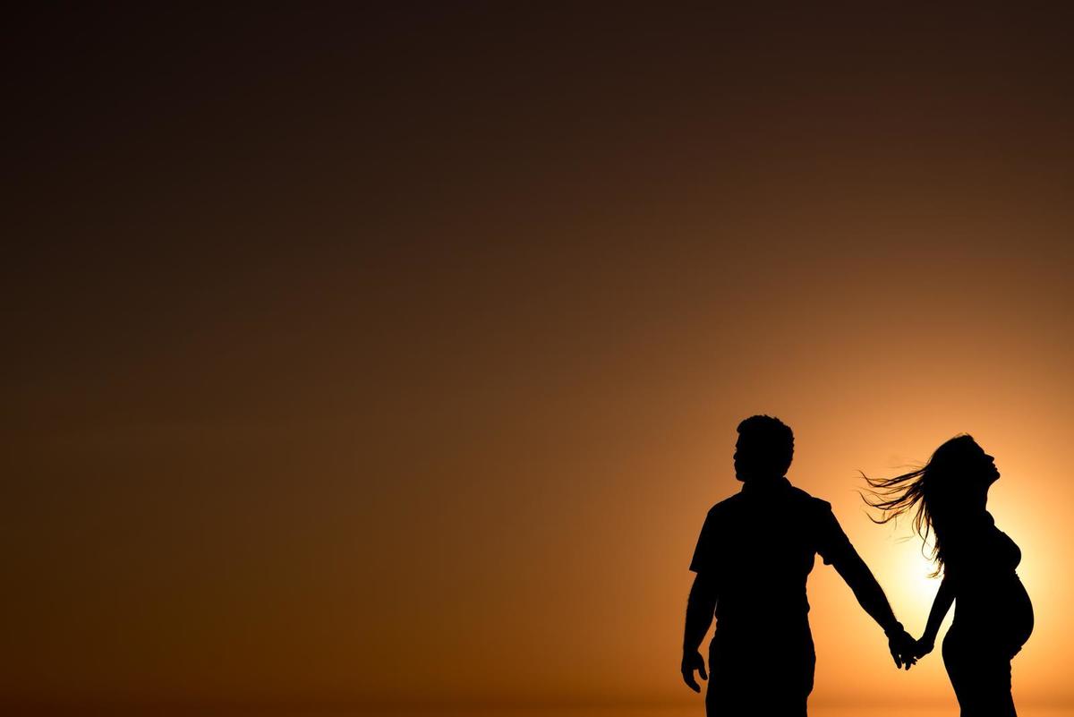 por do sol silhueta em fotografa de gestante fotografo de casamento rafael bigarelli em destination eua florida tampa
