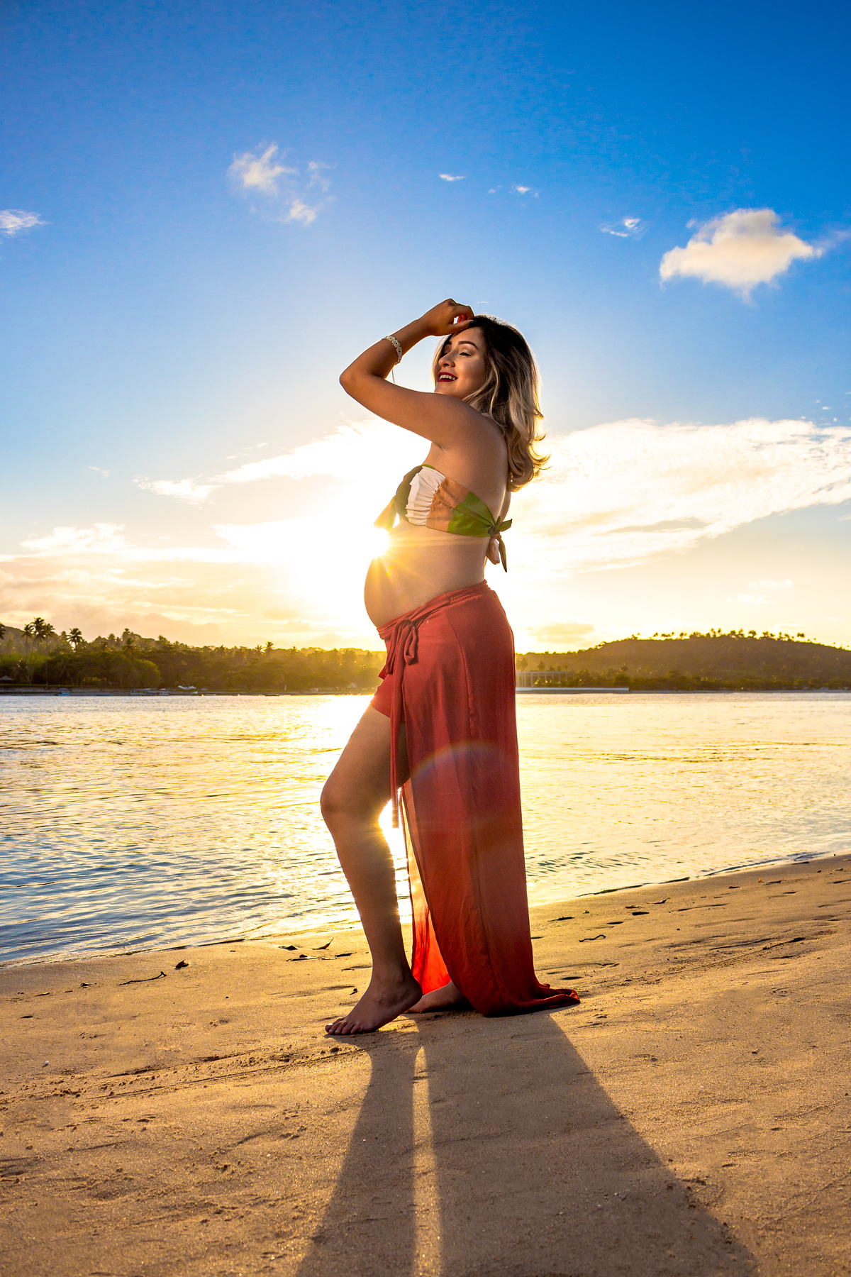 Gestante no por do sol