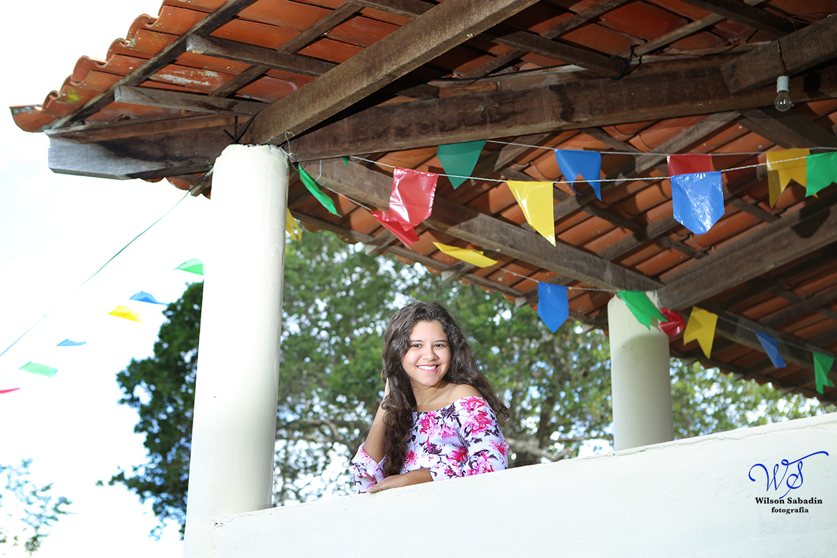fotografia de 15 a debutante na varanda