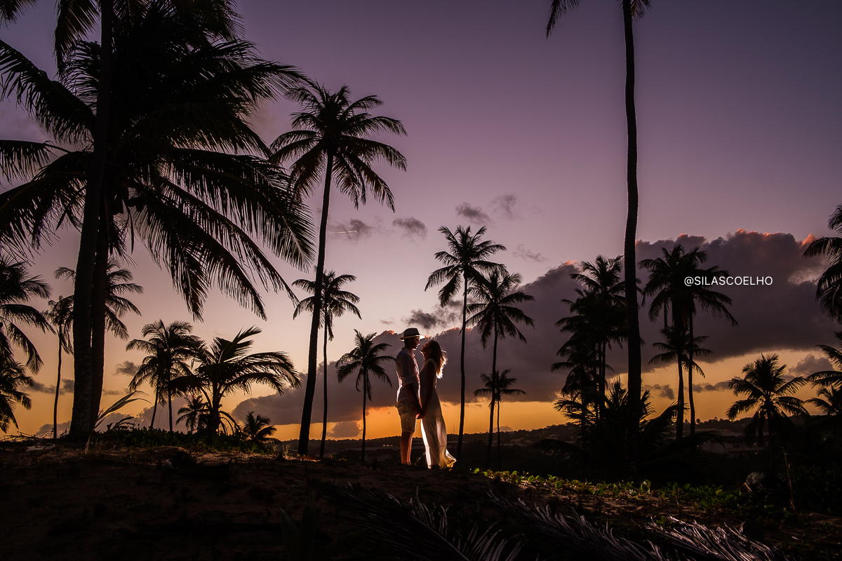 sessão de pre casamento na praia, no por do sol