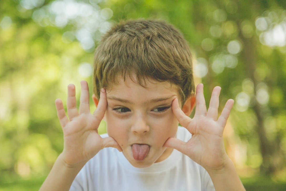 ensaio, família, mãe, pai, filho, beijo, jardim botânico, rio de janeiro, amor, carinho, fotografia, marco brozzo, michelle morelli, rj, parque, dia, luz, criança, ensaio em família
