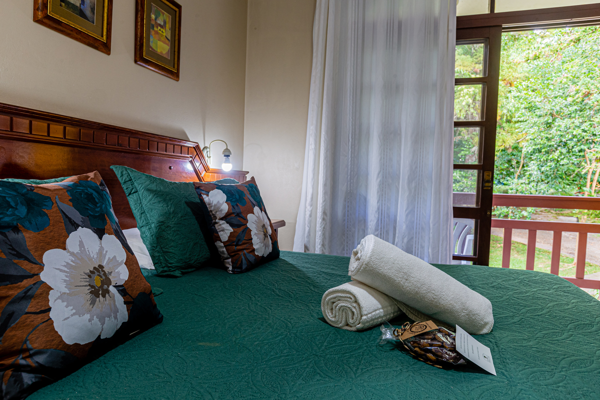 conforto da suíte  na Pousada Bosque Canela.  