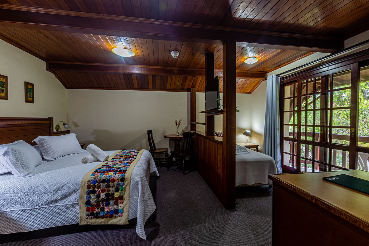 Quarto aconchegante  na Pousada Bosque Canela. 