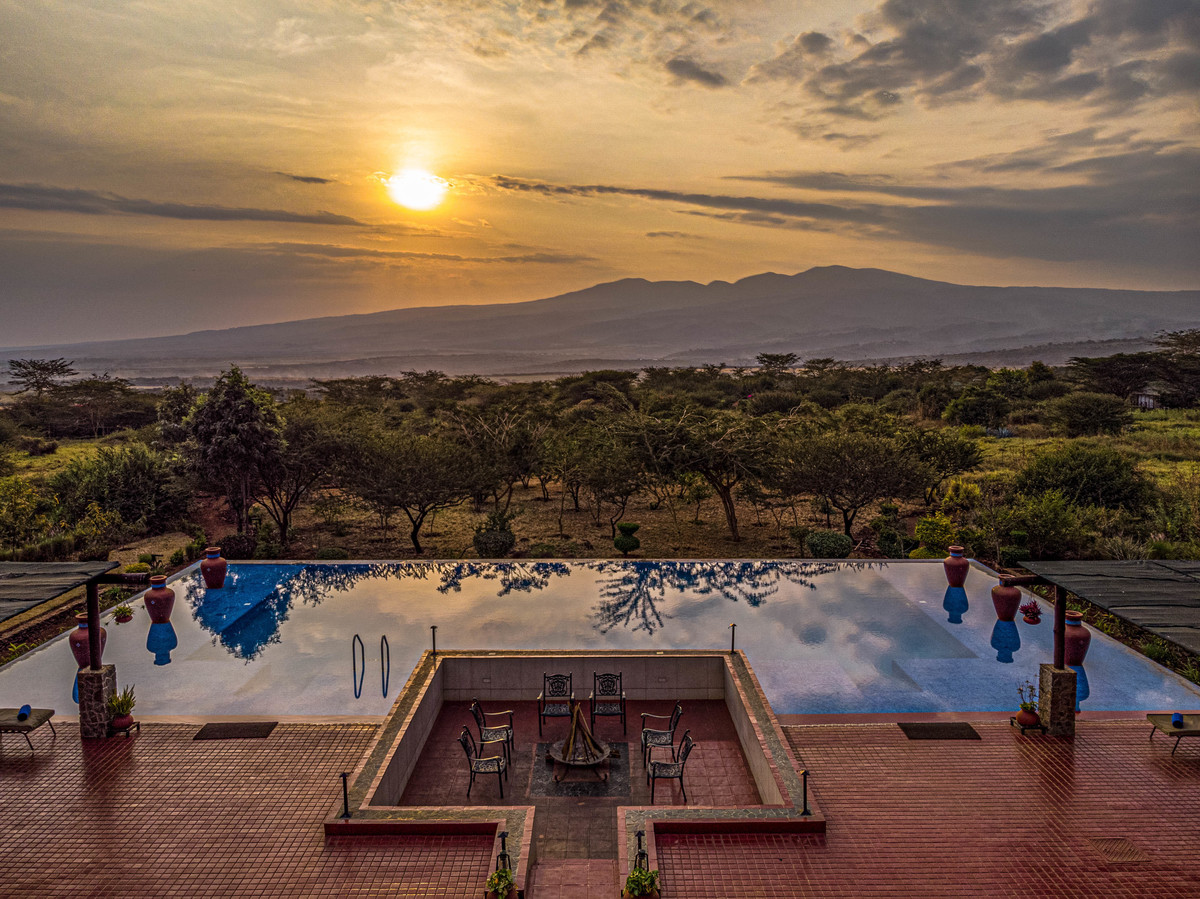pool in the sunset Oldeani Mountain and the Ngorongoro Crater Rim
