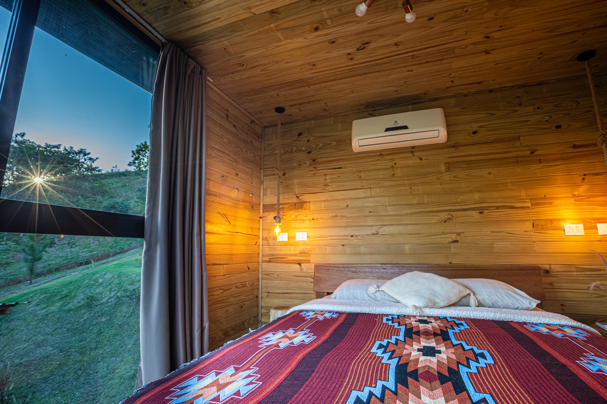 Quarto Into The wild Cabin. por do sol 