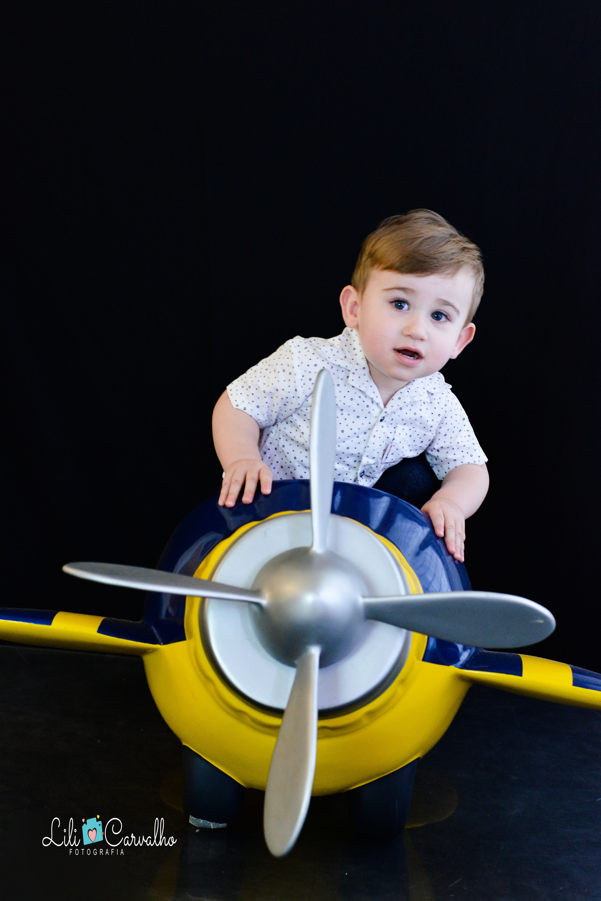 Ensaio fotografico de menino em estudio em Maringá aviacao 